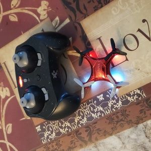 Propell mini drone with remote and original box and extra propellers